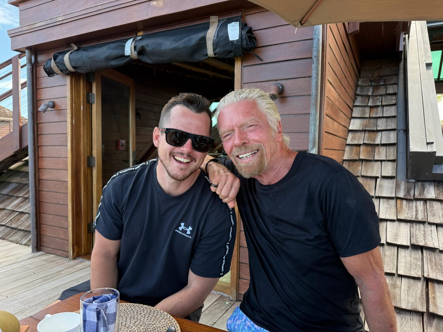 Sebastian Bates with Sir Richard Branson on Necker Island