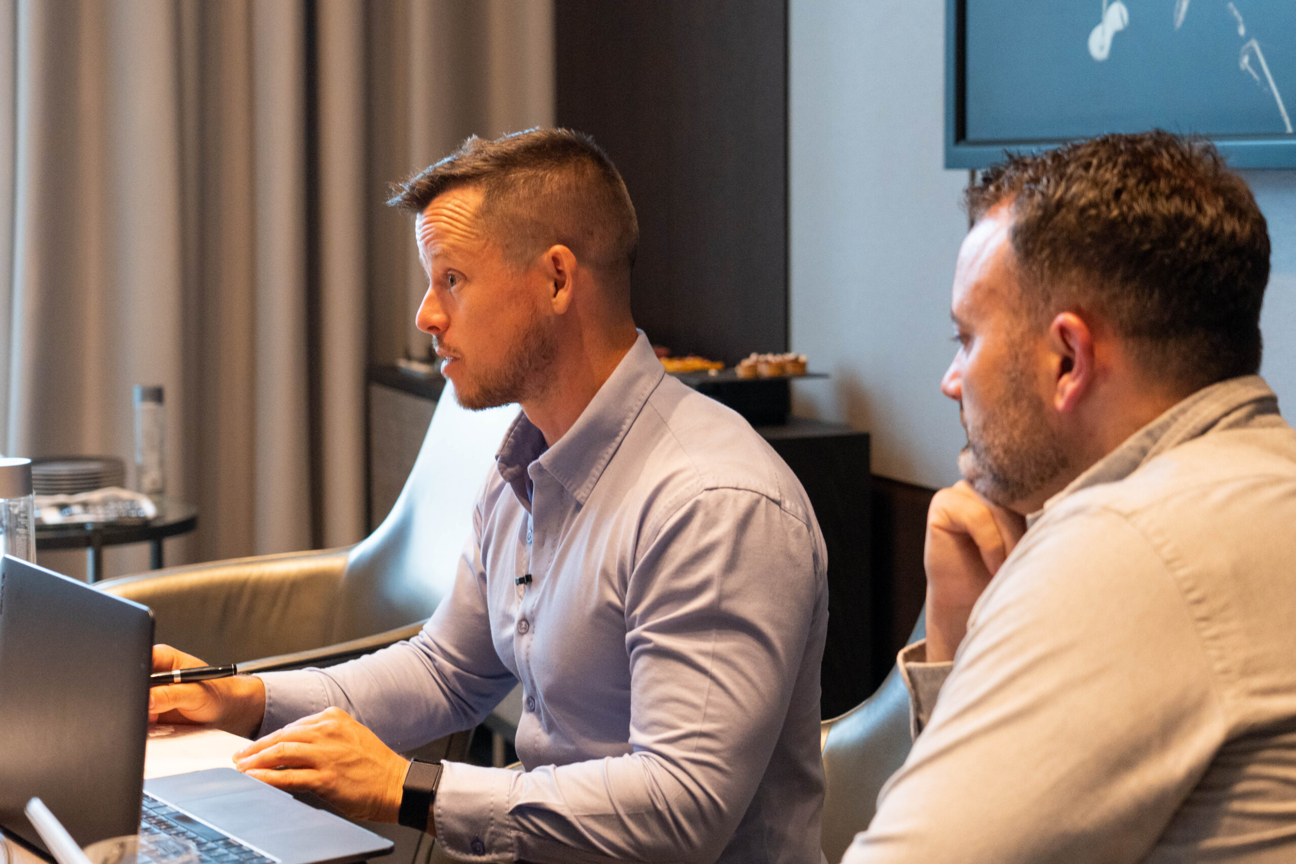 Sebastian Bates working through plans with a colleague